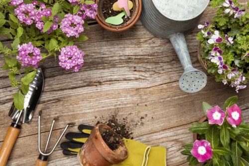 Gardener preparing safety equipment before work